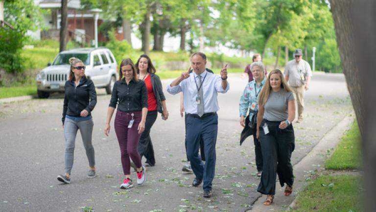 Employees on a walk outside