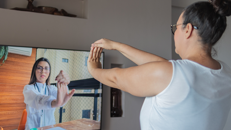 Woman doing stretching virtually 