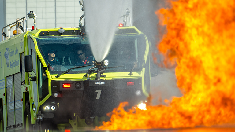 Fire truck putting out fire