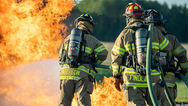 Fire fighters fighting fire