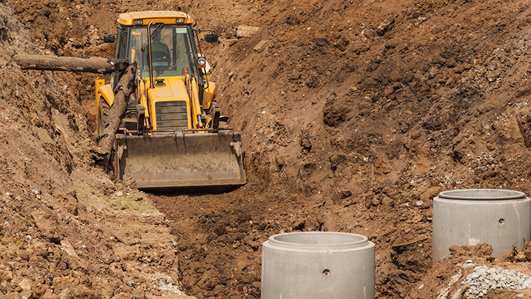 construction truck in ditch
