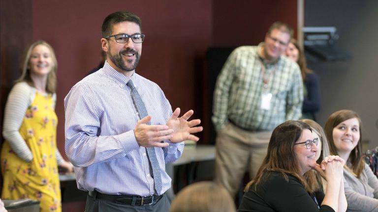 A member of the Senior Leadership Team sharing at a casual all staff meeting.