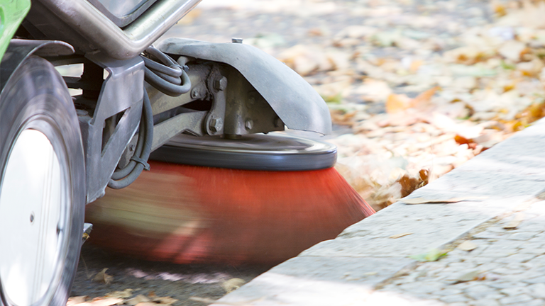 street cleaner brush spinning