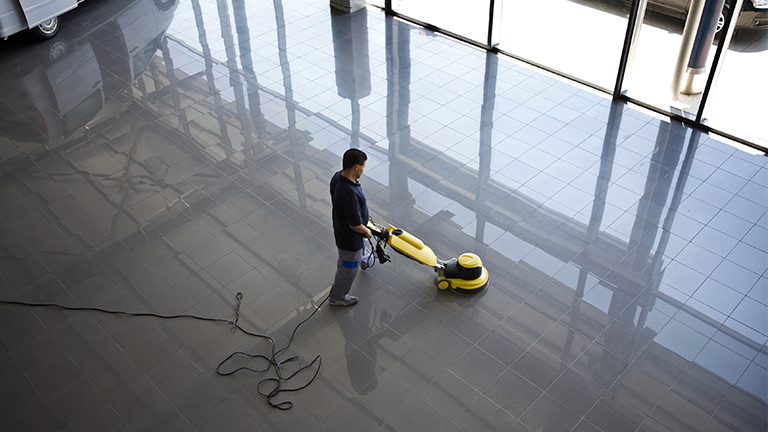 Man cleaning the floor
